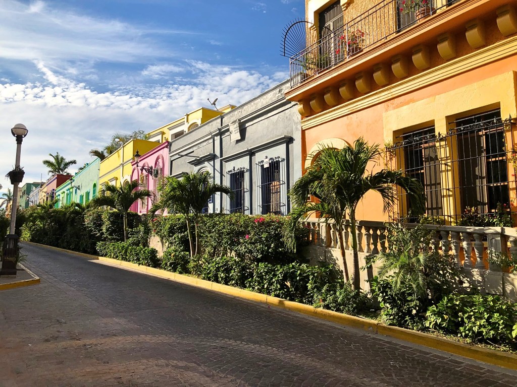Colorful colonial buildings along Ángel Flores Street in Mazatlán historic center.