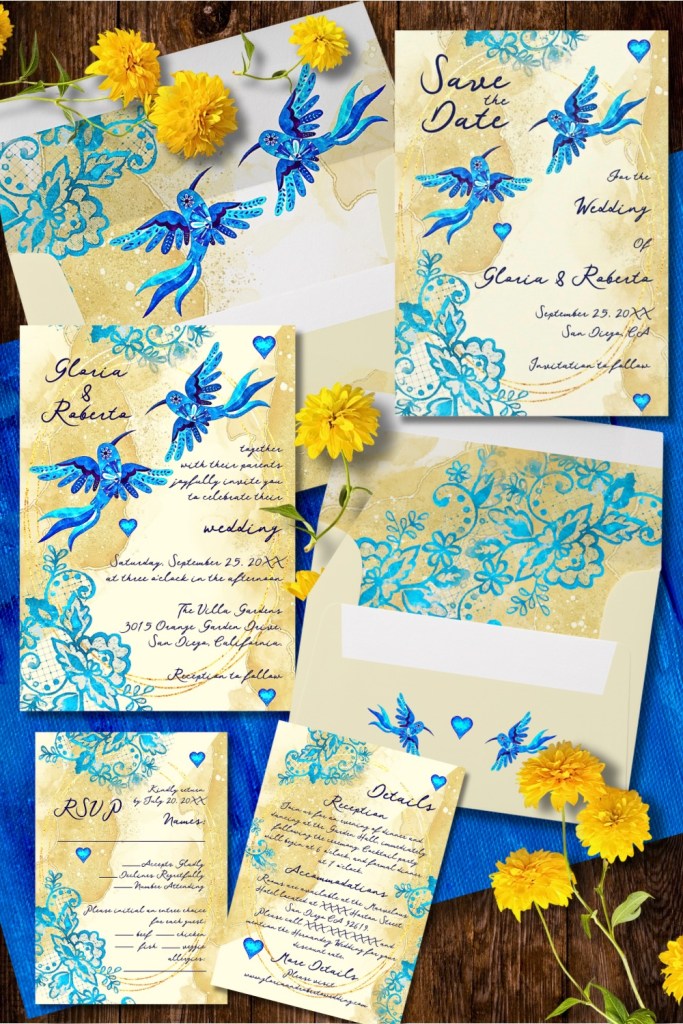 Vivid blue and gold Mexican Baroque wedding invitation suite with watercolor hummingbirds, floral lace motifs, and golden backgrounds — joyful design full of movement and love.