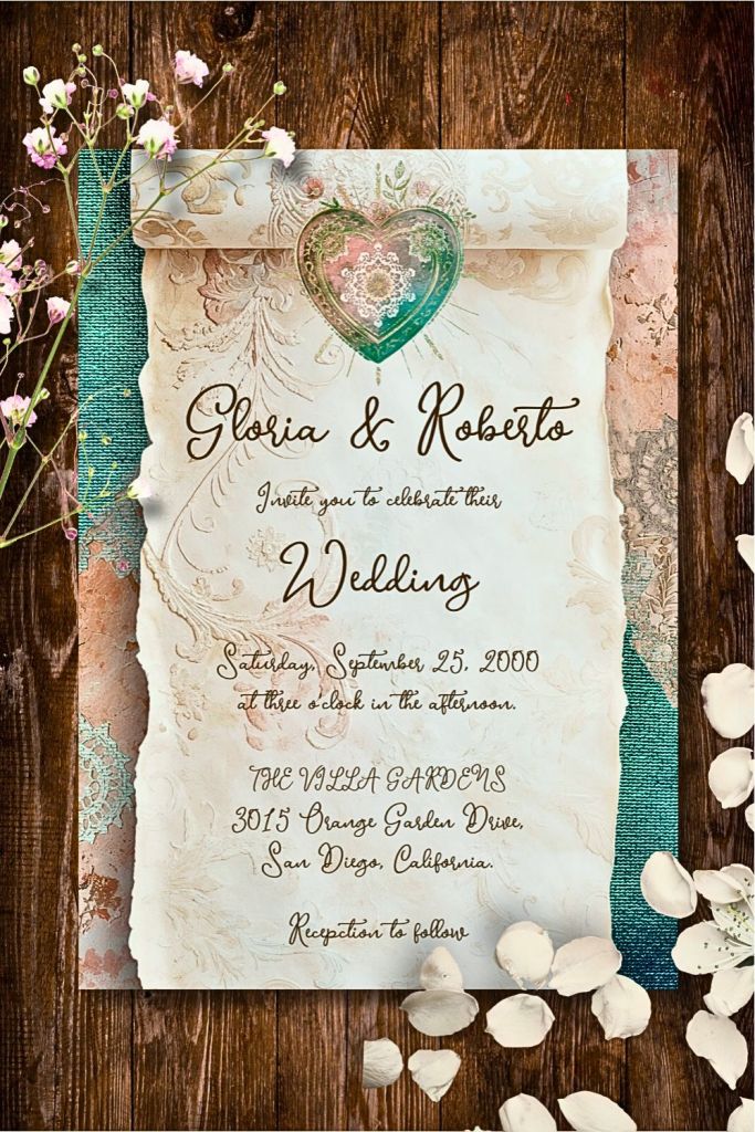 Baroque wedding invitation with rolled parchment edges, teal and rose sacred heart, vintage textures, and flower accents on rustic wood.
