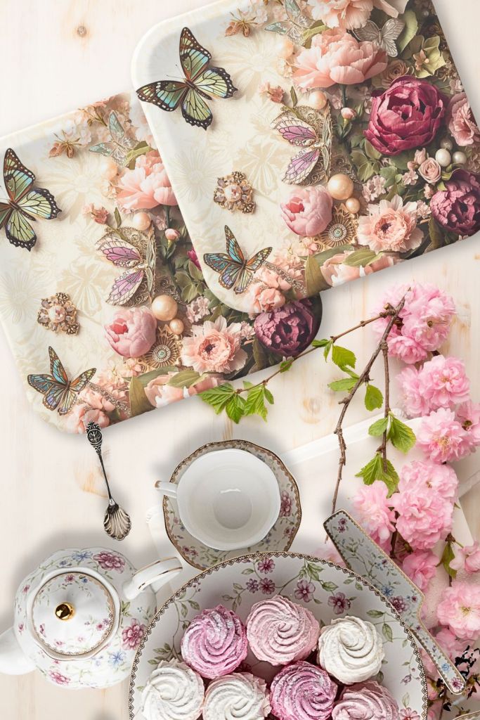 Rococo party plates with butterfly florals styled with porcelain teacups, desserts, and pink blossoms