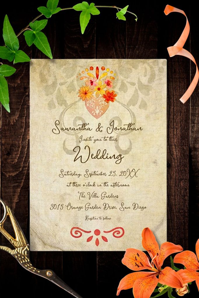 Rose gold baroque sacred heart with ornate floral scrollwork on textured ivory paper background.